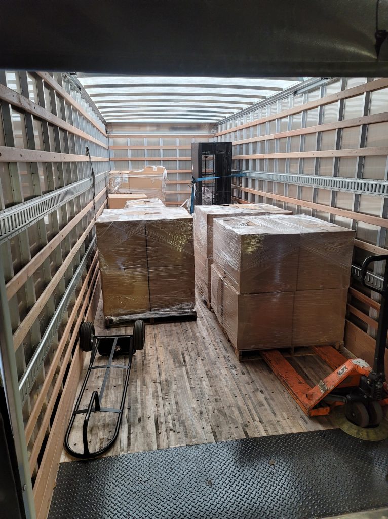 Pallets of equipment loaded on truck