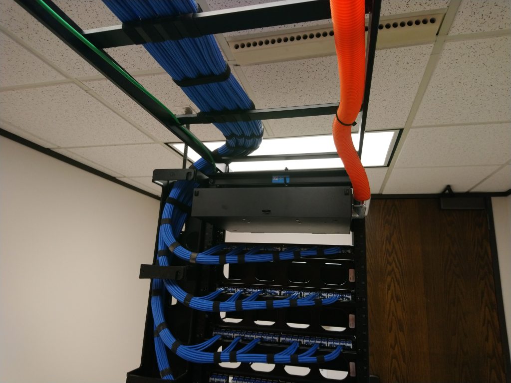 Cable dressed into tray and rear of rack